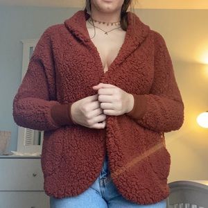 brownish tan sherpa, cuffing by wrists